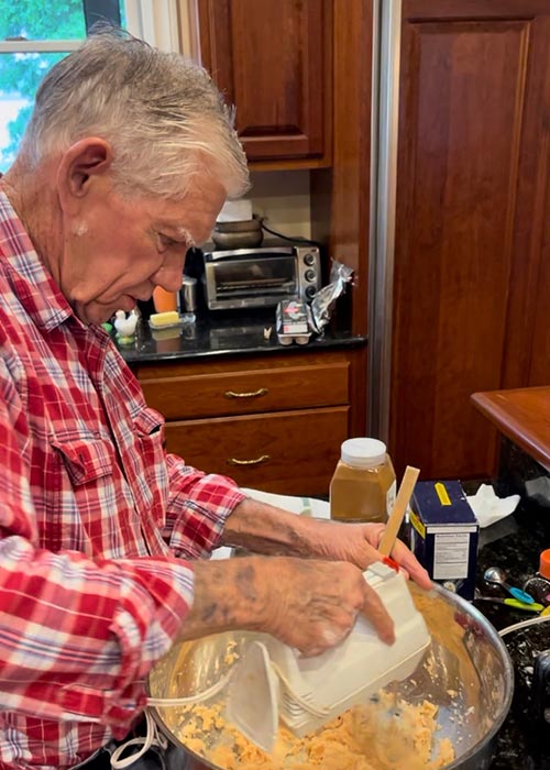 Julie's dad mixing batter